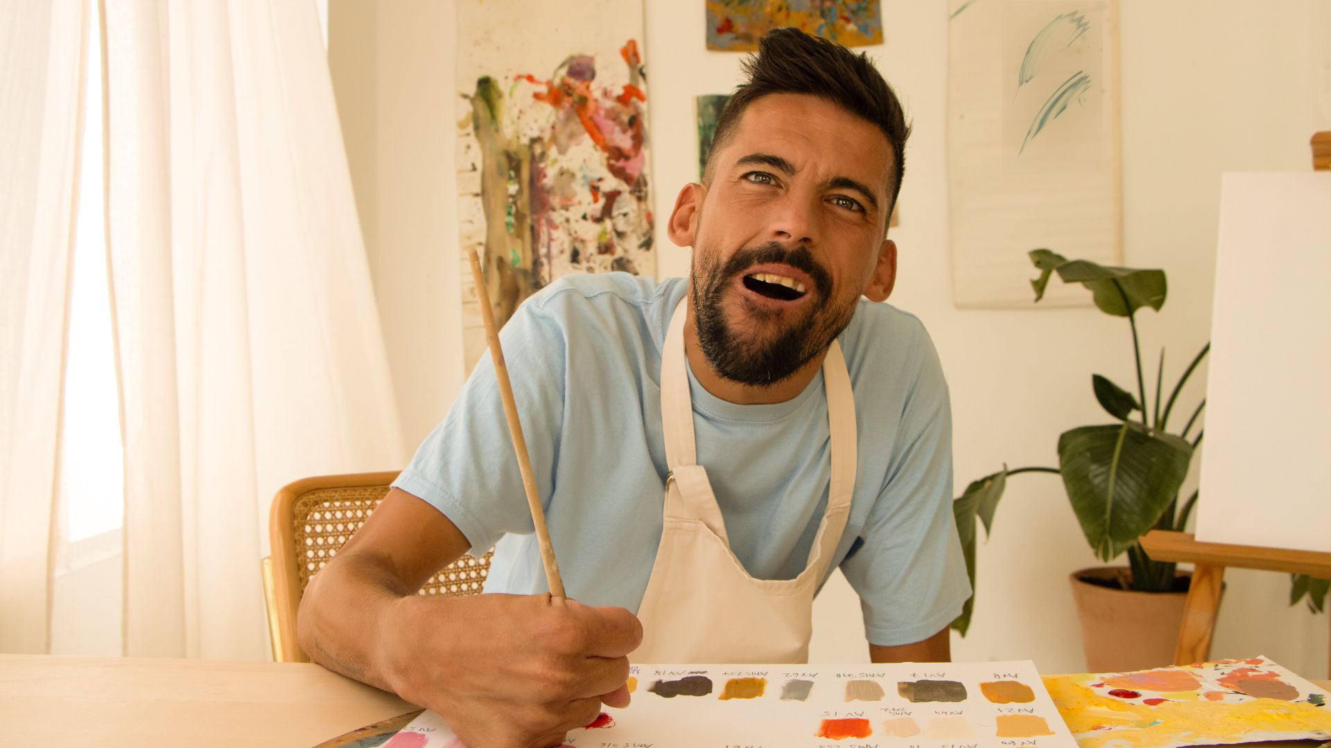 Man with Disability Doing Art Therapy Man Taking Care of Woman with Disability